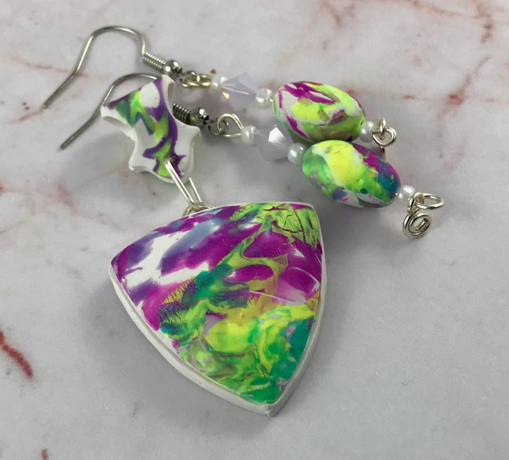 One-of-a-kind pastel abstract polymer clay pendant and matching earrings set with soft blended colours and curved lightweight design.