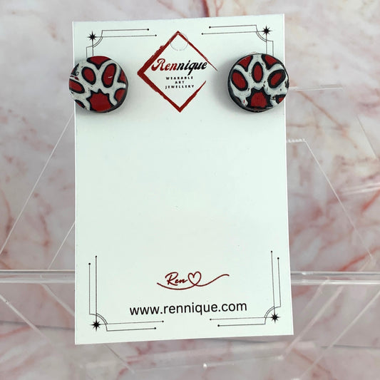 Handmade red black and white stud earrings round statement polymer clay jewelry on display card
