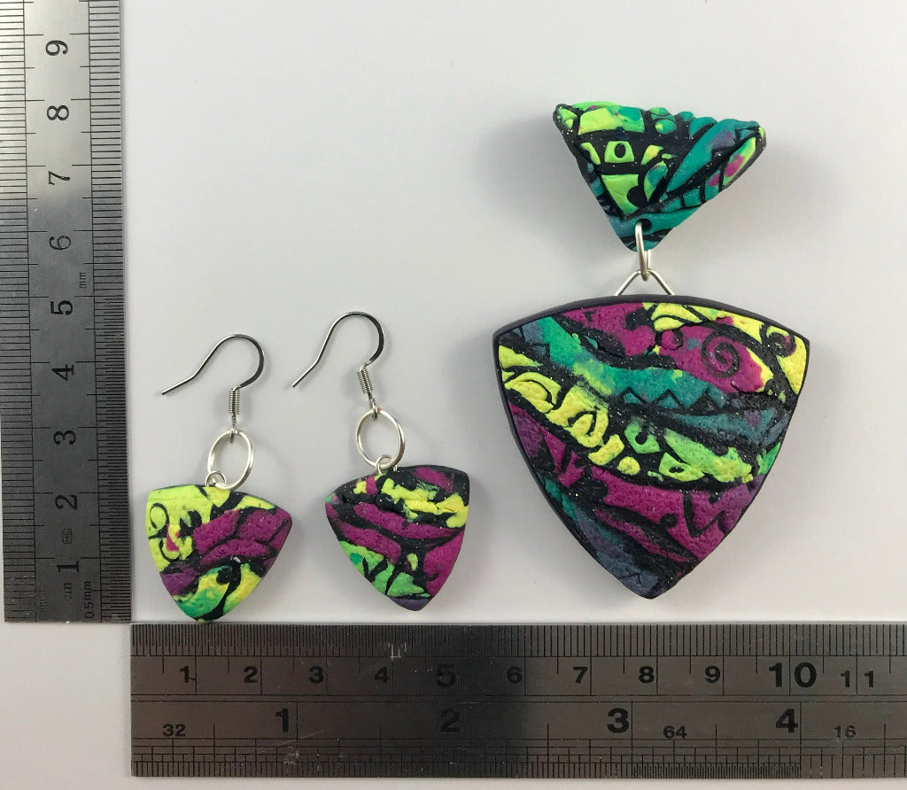Rennique modern patchwork textured polymer clay jewellery set with statement pendant, matching earrings and bracelet shown with size ruler