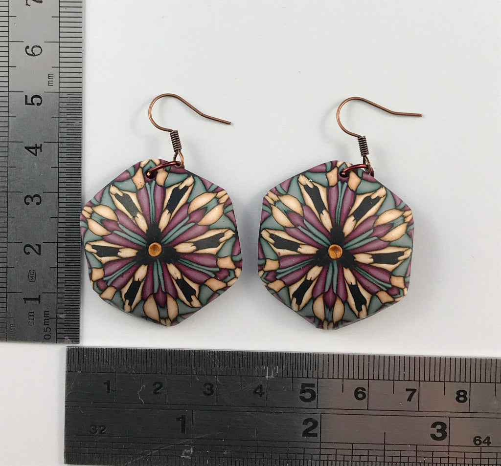 Rennique handmade geometric jewellery set in deep red, plum and sage polymer clay with matching pendant necklace, drop earrings and artisan bracelet, one-of-a-kind wearable art