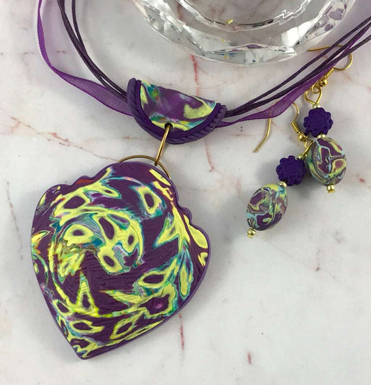Rennique purple heart swirl pendant and matching handcrafted earrings styled as complete artisan jewellery set