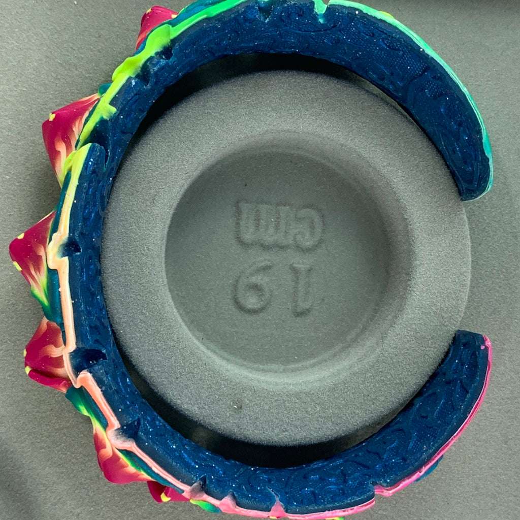 Rennique handmade tropical floral statement cuff bracelet in pink, green and navy blue polymer clay with 19 cm size reference.