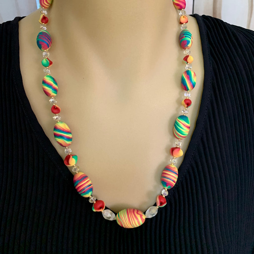 multicoloured women's fashion necklace with crystal beads between polymer clay multicolour feature beads.